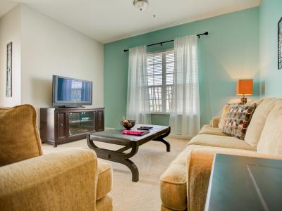 Entertainment meets comfort: our living area is your haven for leisure and relaxation.