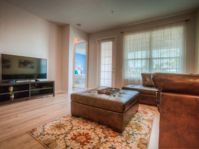 Embrace the comfort of our homey living area, where plush sofas and warm decor invite you to unwind.