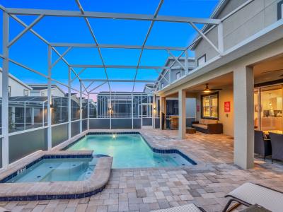 Calming Private Pool of the Home in Reunion Florida - The private pool and spa offer an exclusive oasis of relaxation and indulgence - Thoughtful lighting for day and night use