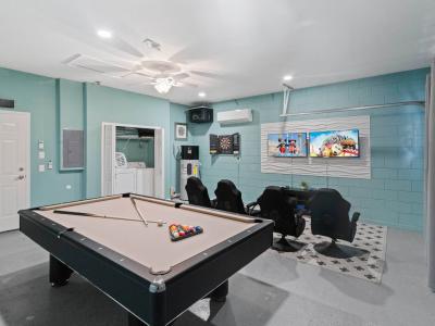 Game_Room  Enjoy our Game Room that boasts 2 LCD TV's, 2 PS4 consoles, 4 pro gaming chairs, professional pool table and a dartboard.