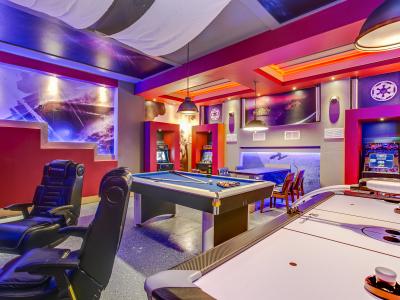 Step into our ultimate man cave, complete with game tables and arcades for endless entertainment.