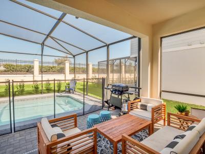 Cozy outdoor Sitting Area of the Apartment in Reunion Florida - Breathe in the fresh air, unwind in our outdoor oasis - Every moment becomes a cherished memory - Relax and unwind in our serene setting