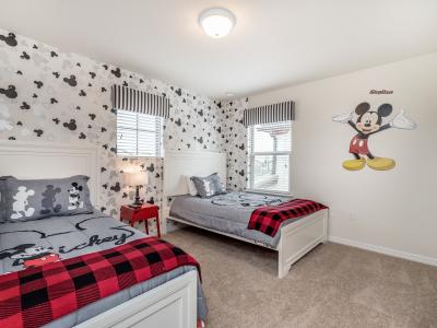 Step into the enchanting world of Mickey Mouse with this themed 2 bed bedroom. Every corner is adorned with the whimsy and wonder of Disney's iconic character, promising endless adventures and dreams come true.