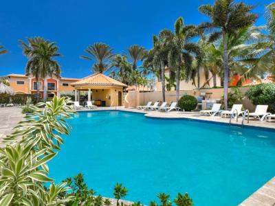 Shared pool with lounge chairs to soak up the sun